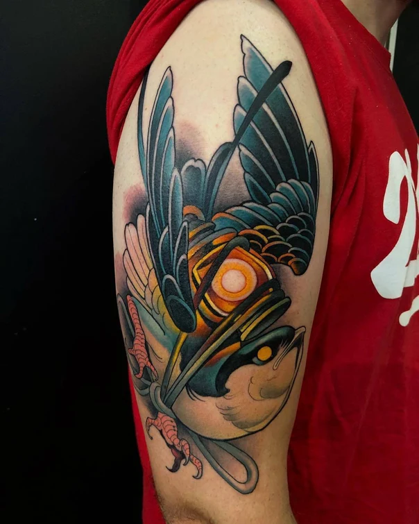 Neo Traditional Bird tattoo on Upper Arm