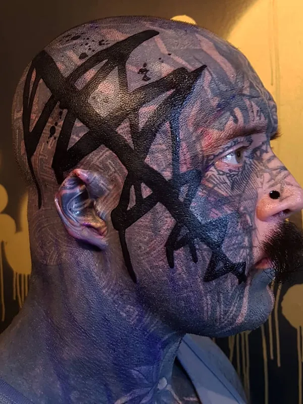 male black blackwork tattoo on face #26698 | Tattoo Artist Yonah Krank