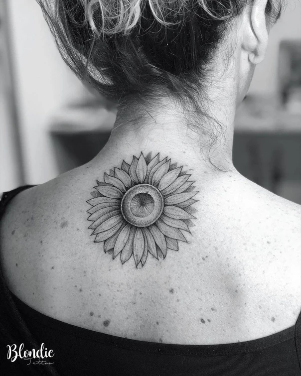 Blackwork Sunflower tattoo on Upper Back