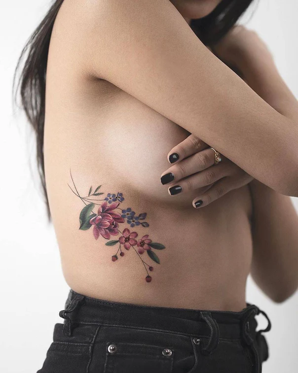Botanic Flowers, Leaves tattoo on Ribcage