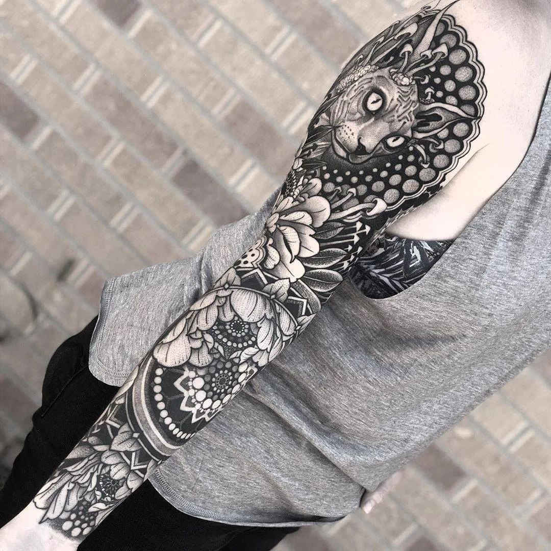 Tattoo artist Jayce Wallingford, black author's large-scale neotraditional ornamental tattoo with oriental motifs | Denver, United States