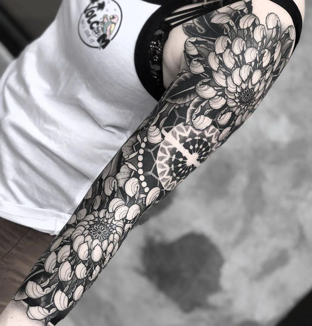 Tattoo artist Jayce Wallingford, black author's large-scale neotraditional ornamental tattoo with oriental motifs | Denver, United States