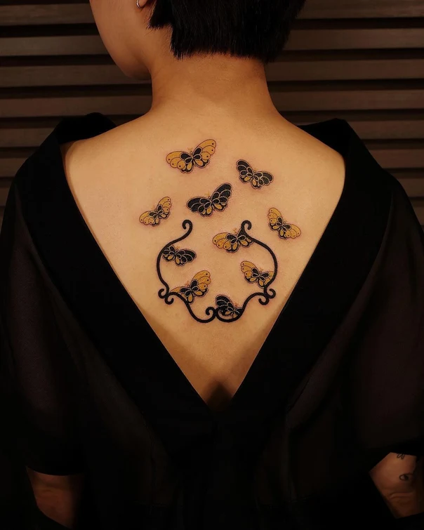 Ornamental Butterfly, Floral tattoo on Upper Back