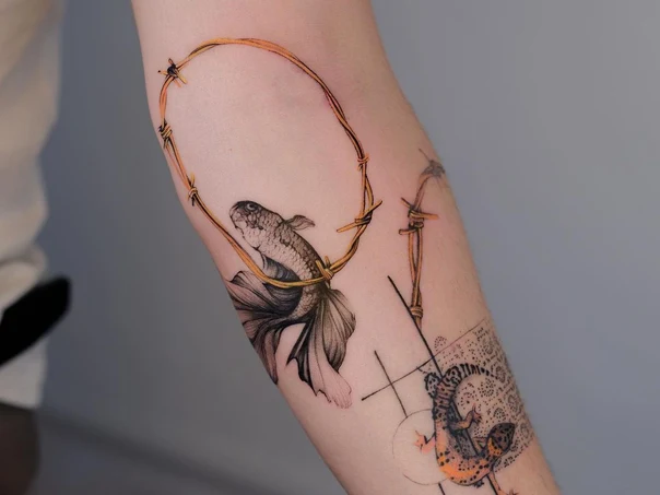 Illustrative Fish, Barbed wire tattoo on Forearm