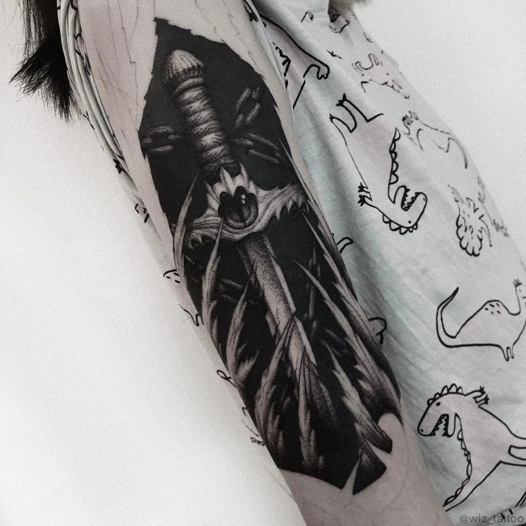 Slavic horror sword tattoo by Evgeny Wiz