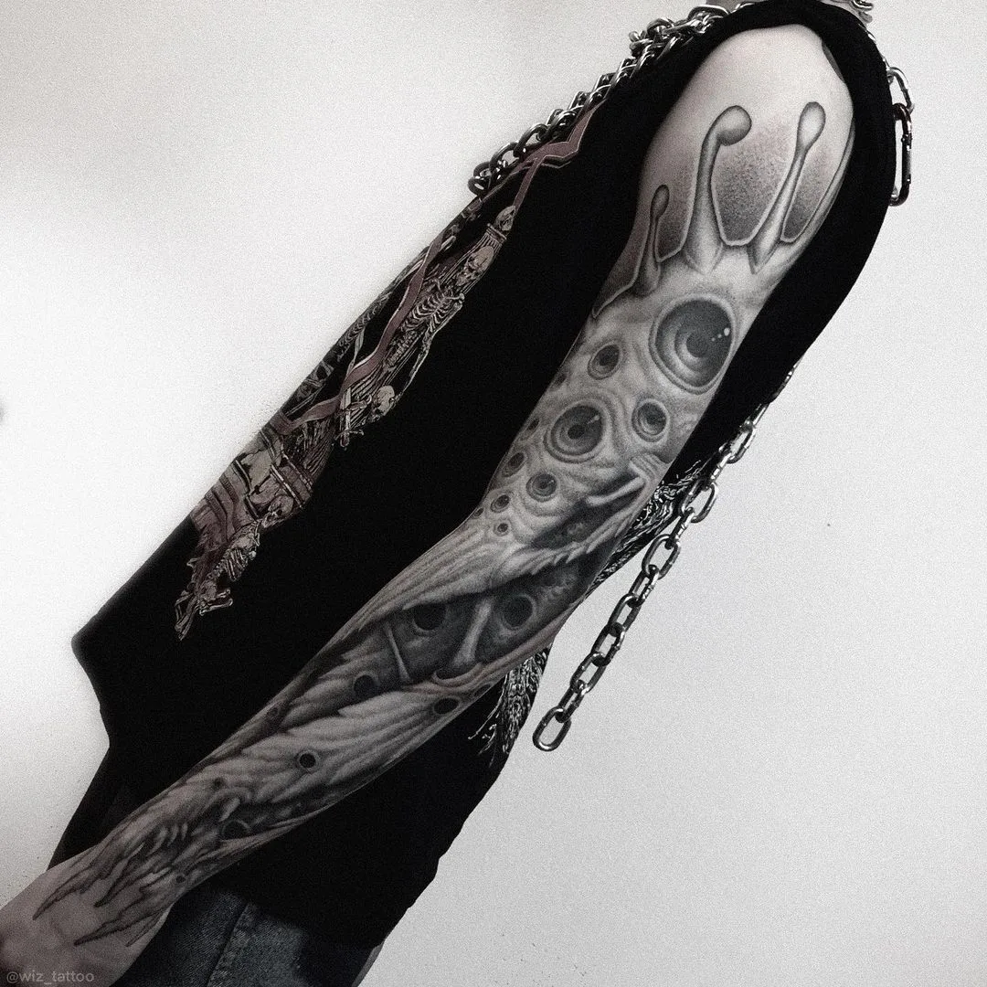 Slavic horror sleeve tattoo by Evgeny Wiz