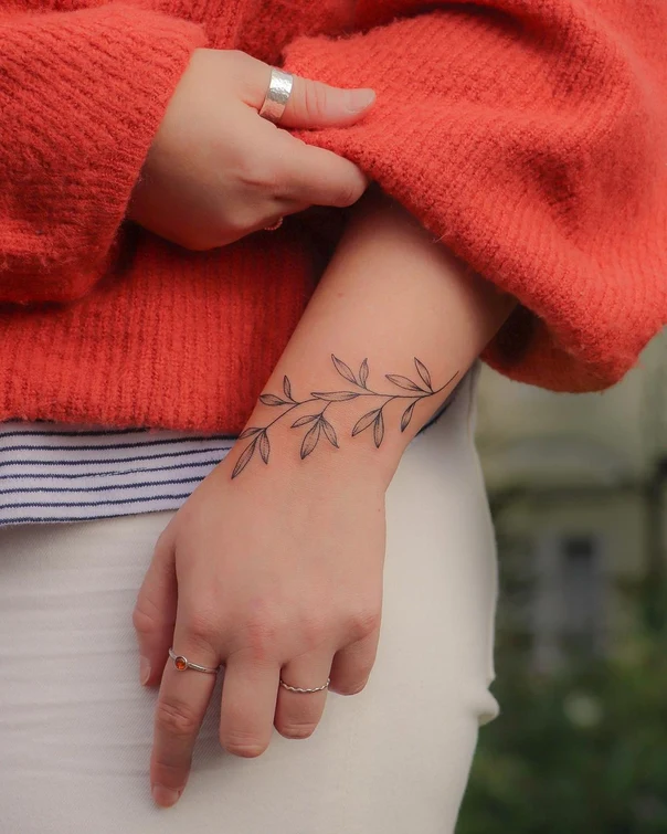 Fineline Leaves tattoo on Wrist