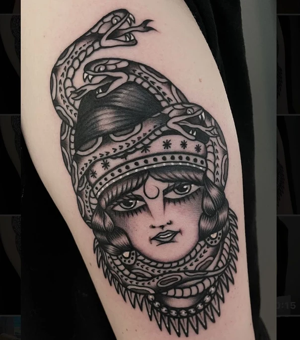Neo Traditional Snake, Face tattoo on Upper Arm
