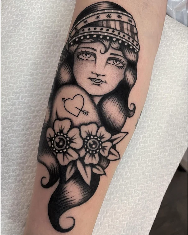 Traditional Woman, Heart tattoo on Forearm
