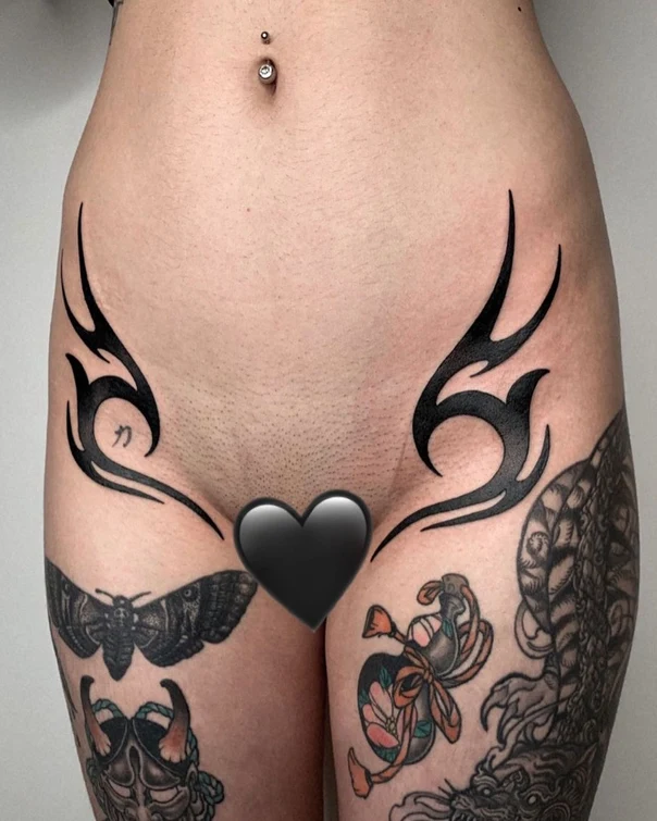 Tribal Tribal, Moth tattoo on Thigh