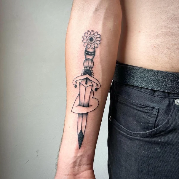 Traditional Dagger, Flower tattoo on Forearm