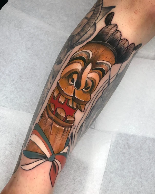 Traditional Mask tattoo on Forearm