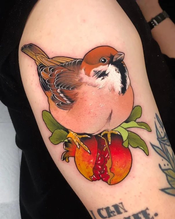 Illustrative Bird, Pomegranate tattoo on Upper Arm