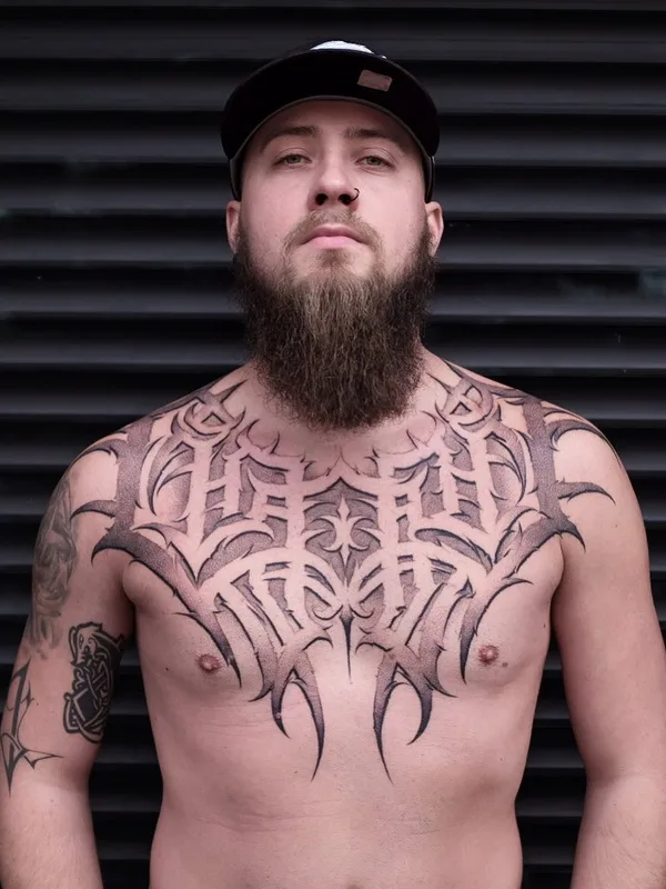 male black and grey ornamental tattoo auf chest #45744 | Tätowierer Сергей Murdoc
