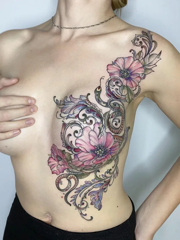 female color ornamental tattoo auf ribcage #45904 | Tätowierer Елена Баски