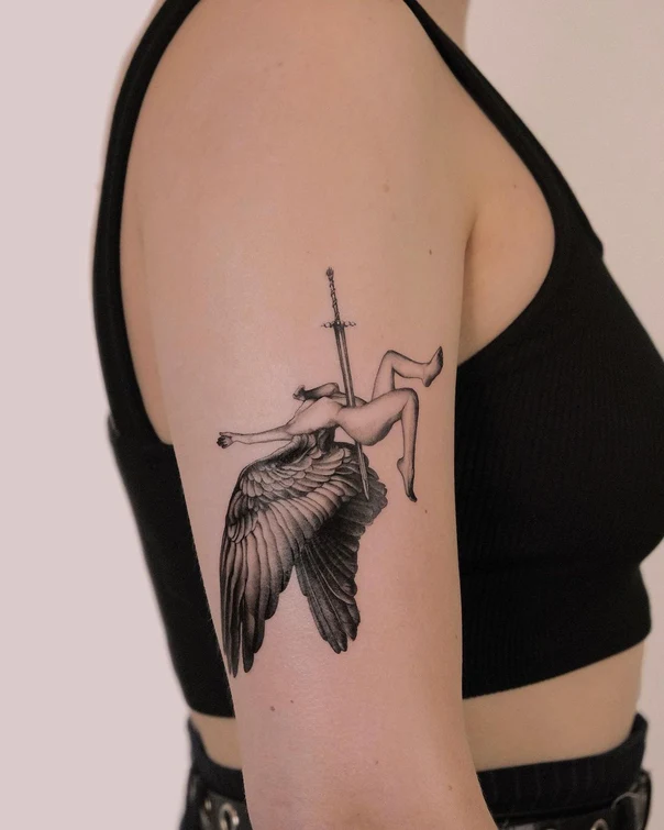 Black & Grey Angel wings, Sword tattoo on Upper Arm
