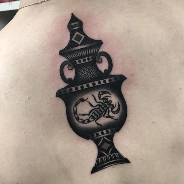 Traditional Scorpion, Urn tattoo on Upper Back