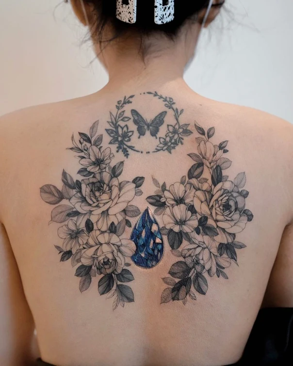 Fineline Floral, Butterfly tattoo on Upper Back