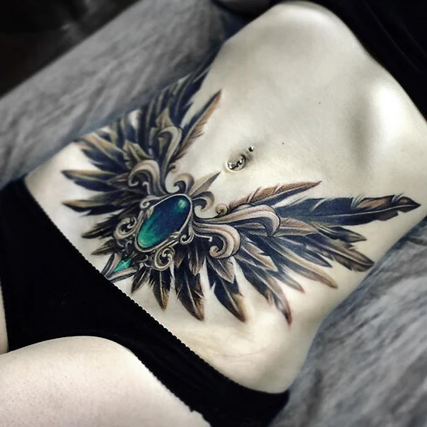 Орнаментальная Wings, Gemstone tattoo на Живот