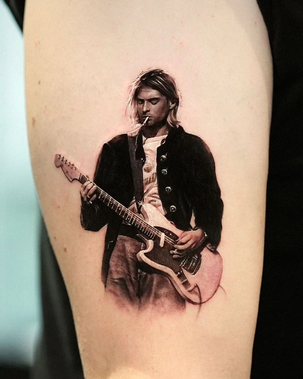 Realism Portrait, Guitar tattoo on Upper Arm