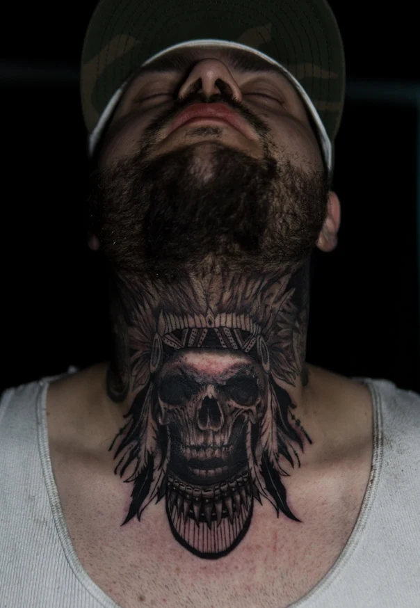 Black & Grey Skull, Feathers tattoo on Neck