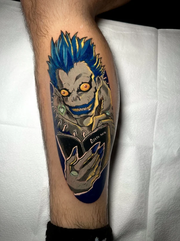 Anime Character, Book tattoo on Calf