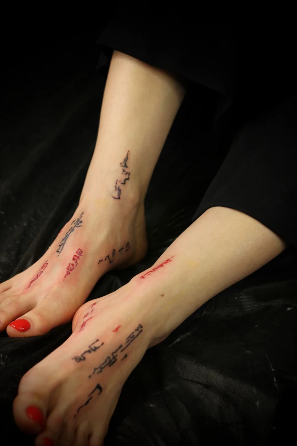 Calligraphy Text tattoo on Foot