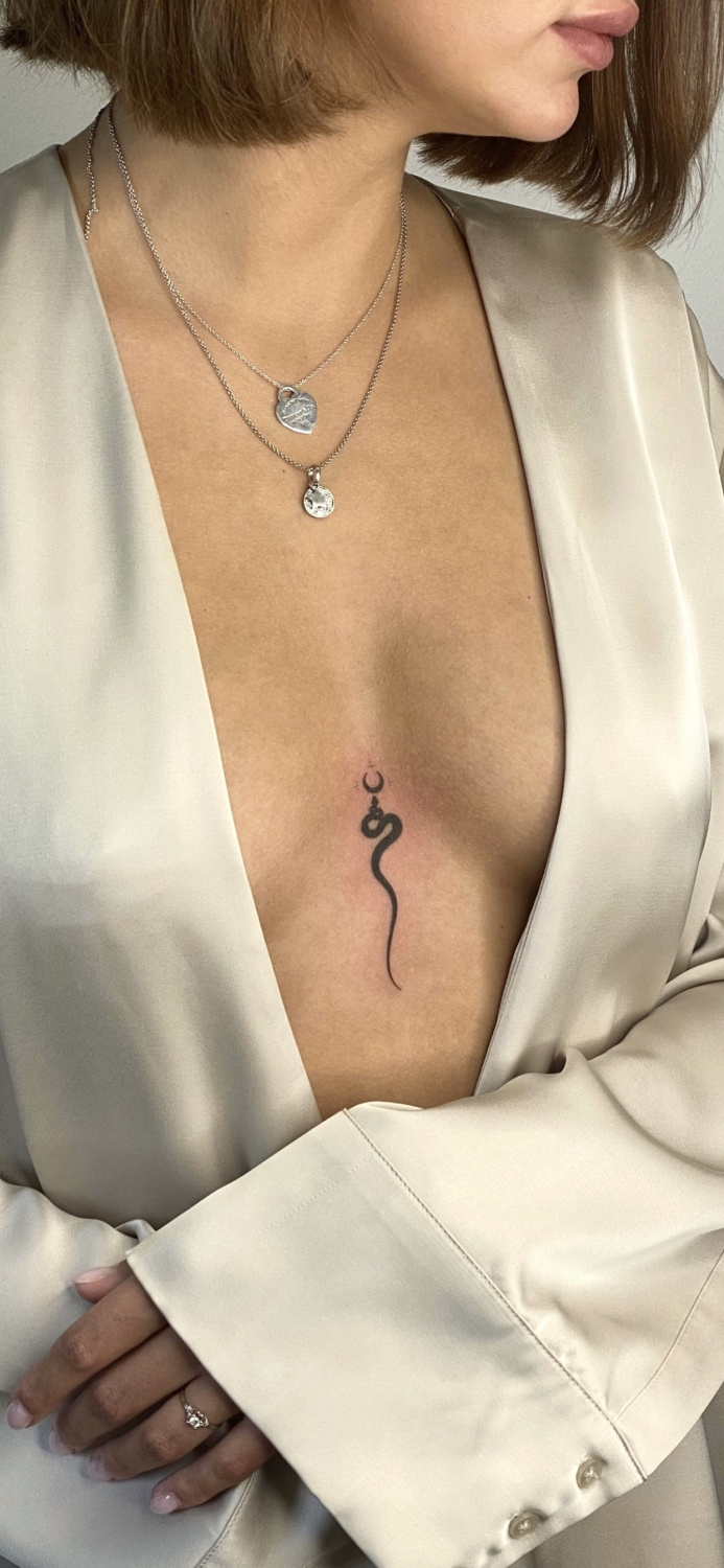 Black tattoo by Artemii Zhdanov