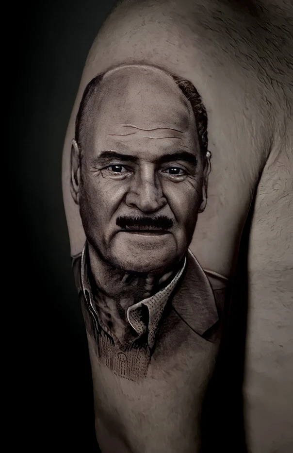 Realism Portrait tattoo on Upper Arm