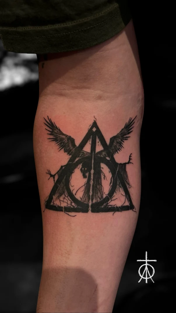 Blackwork Deathly hallows, Crow tattoo on Forearm