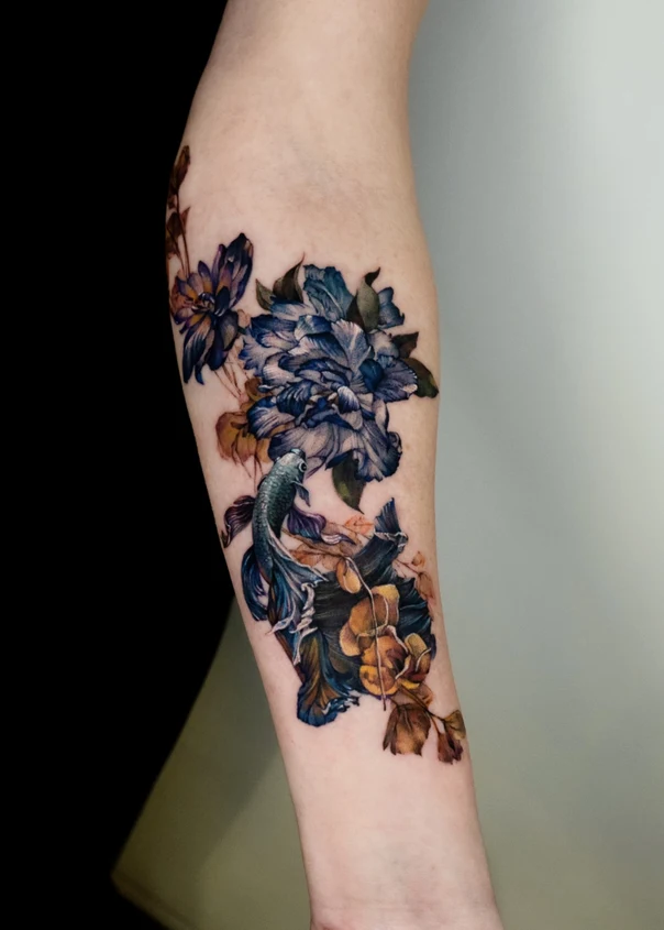 Illustrative Fish, Flowers tattoo on Forearm