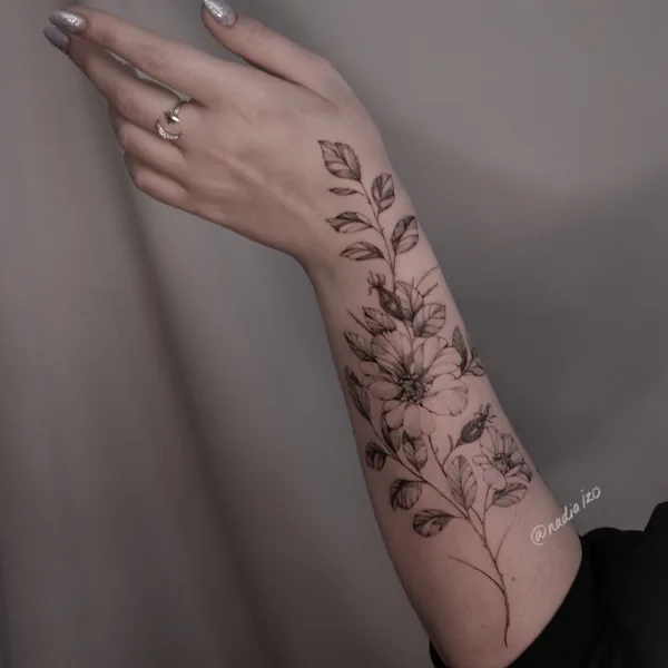 Botanical tattoo by Nadia Izo in Moscow