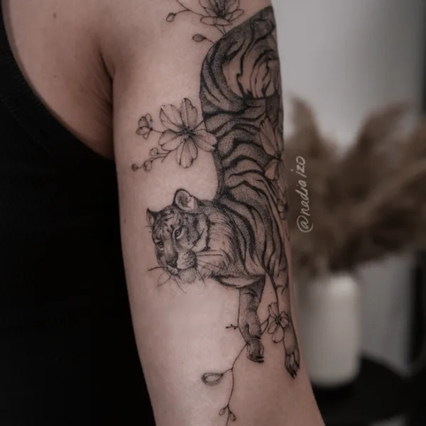 Botanical tattoo by Nadia Izo in Moscow