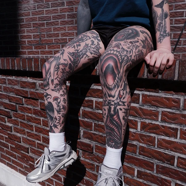 Illustrative Skull, Bat tattoo on Full leg