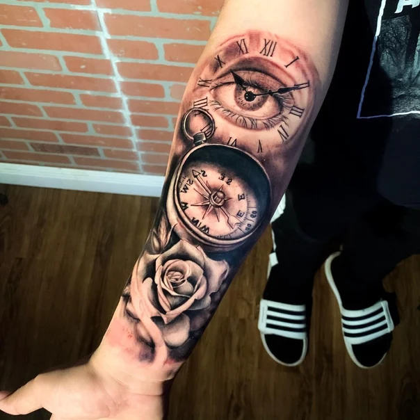 Realism Eye, Compass tattoo on Forearm