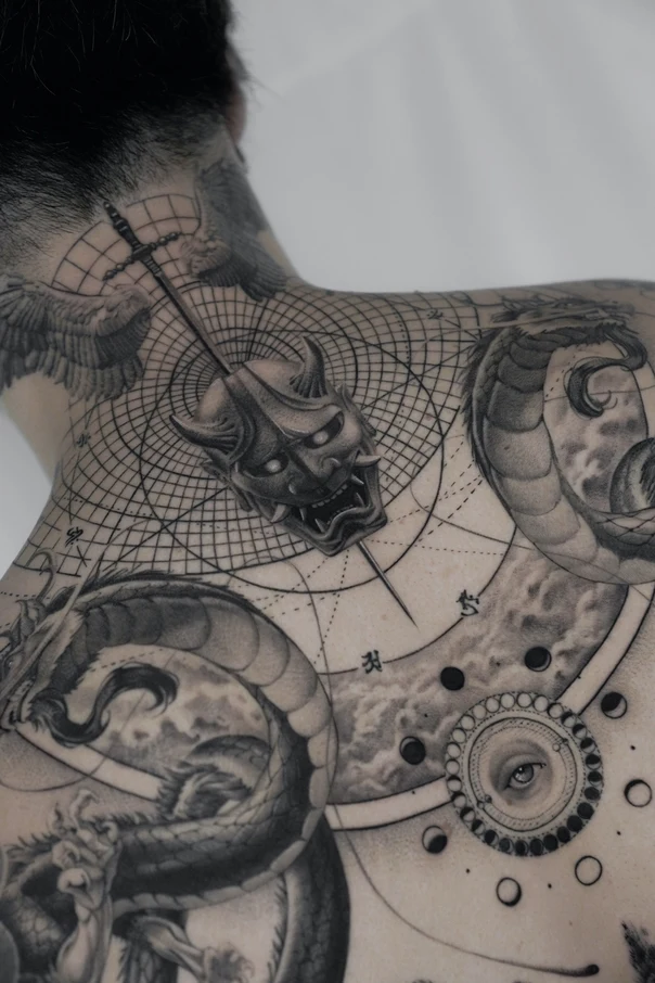 Blackwork Dragon, Mask tattoo on Upper Back