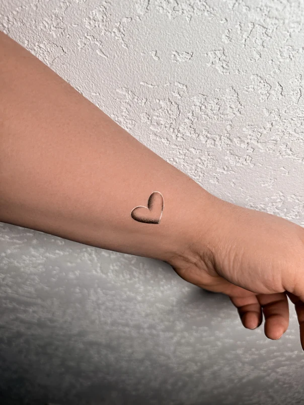Minimalism Heart tattoo on Wrist