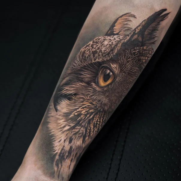 Realism Owl tattoo on Forearm