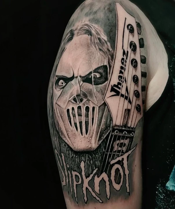 Realism Portrait, Guitar tattoo on Upper Arm