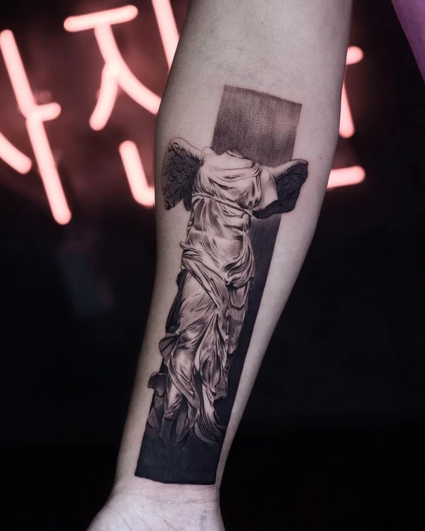 Black & Grey Statue, Wings tattoo on Forearm