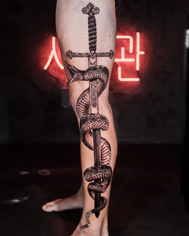 Realism Snake, Sword tattoo on Calf