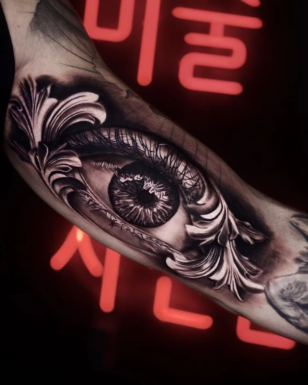 Realism Eye, Floral tattoo on Forearm
