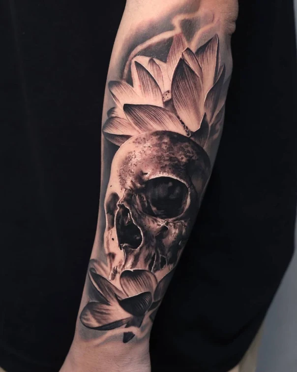 Realism Skull, Lotus tattoo on Forearm