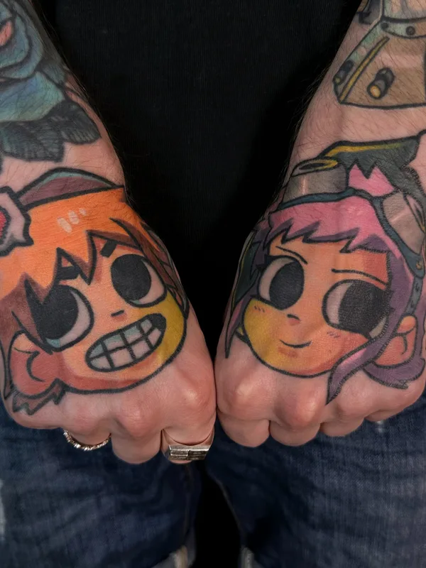 color cartoon Tatuagem em hand #79566 | Tatuador Игорь Скобелев