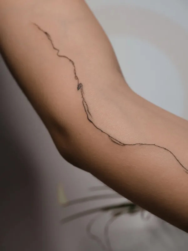female black ornamental Tatuaggio su forearm #79930 | Tatuatore DARI INK