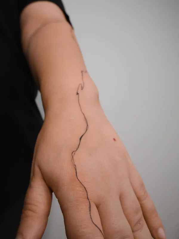 female black ornamental Tatuaggio su forearm #79934 | Tatuatore DARI INK