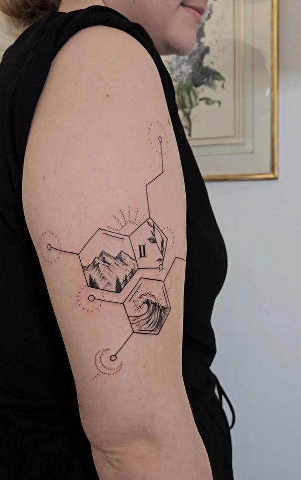 Linework Mountains, Wave tattoo on Upper Arm