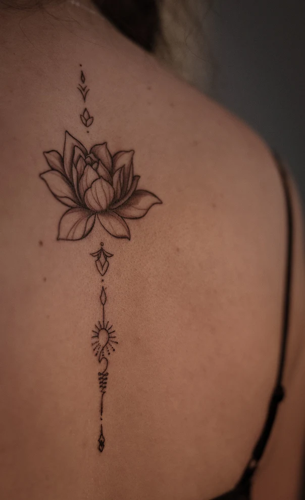 Fineline Lotus, Geometric tattoo on Shoulder Blade