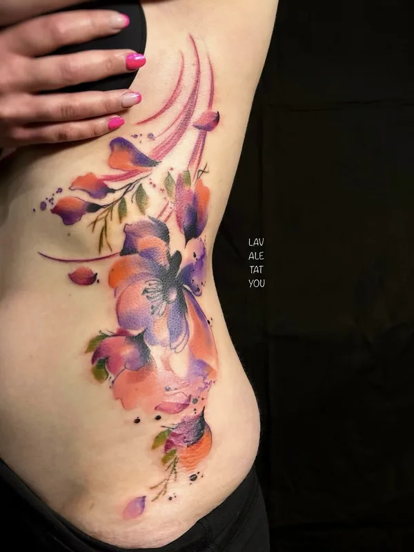 female color watercolor tatuaje en side #81431 | Tatuador LaVale TatYou
