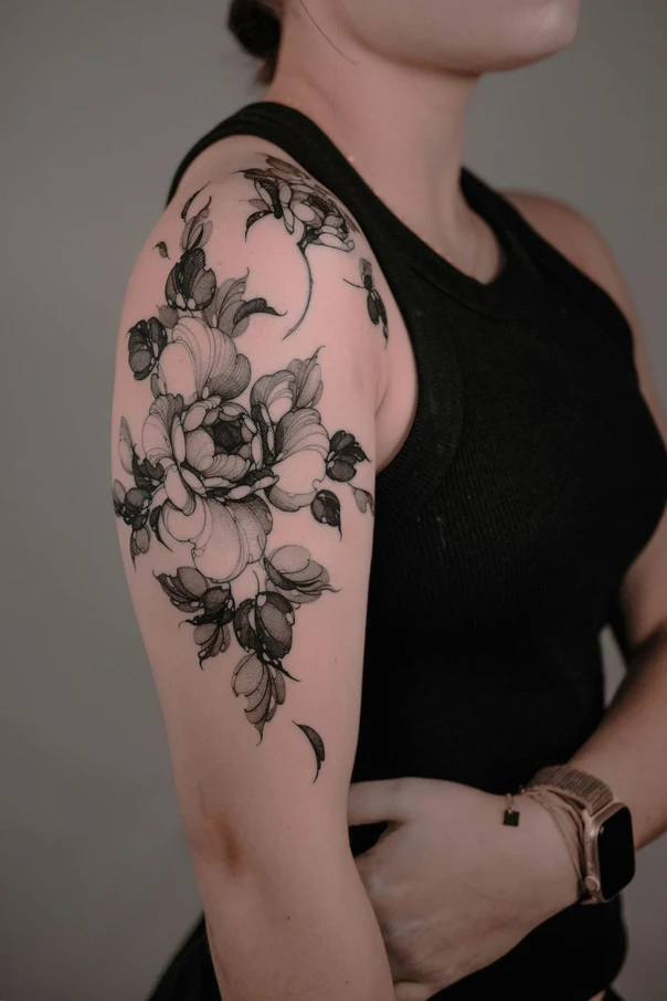 Illustrative Flower, Leaves tattoo on Upper Arm